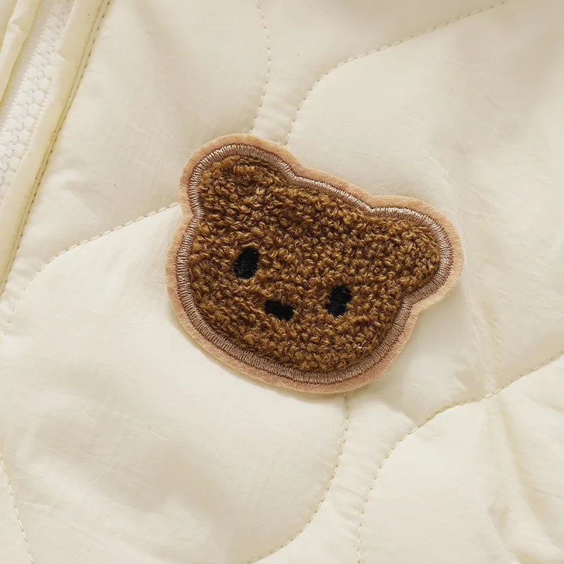 Newborn teddy bear onesie