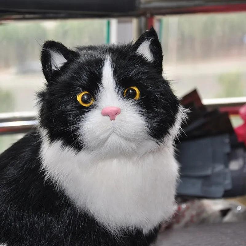 Black and white cat plush